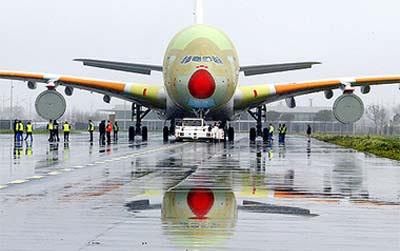 An Airbus new super-jumbo A380 is pulled on the tarmac