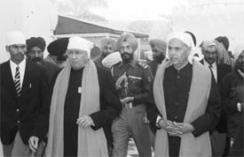Lieut-Gen S.F. Rodrigues (retd), Governor, Punjab (left), comes out after paying his obeisance at Gurdwara Fatehgarh Sahib on Friday.