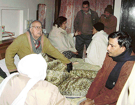 Mr V.K. Agnihotri narrates the incident of the murder of his wife, Ms Sundri Agnihotri (inset), to his relatives at his house in Sector 21, Chandigarh, on Saturday. 