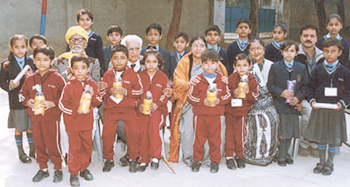 Meritorious children at the 154th birth anniversary of founder of Dev Samaj, Shri Dev Guru Bhagawandevji.