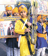 Children participating in a procession on the eve of the martyrdom day of the Sahibzadas of Guru Gobind Singh in the Capital on Saturday.