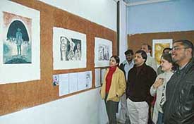 Print-makers from the Lalit Kala Akademis Garhi Studio have the final look at their creations which were displayed at Government Art College after the conclusion of week-long camp