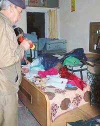 A policeman investigates the theft in a Sector 47 house, Chandigarh, on Sunday