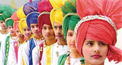 Students of Divya Public School, Sector 44-D, Chandigarh, wait for their turn at the annual prize distribution