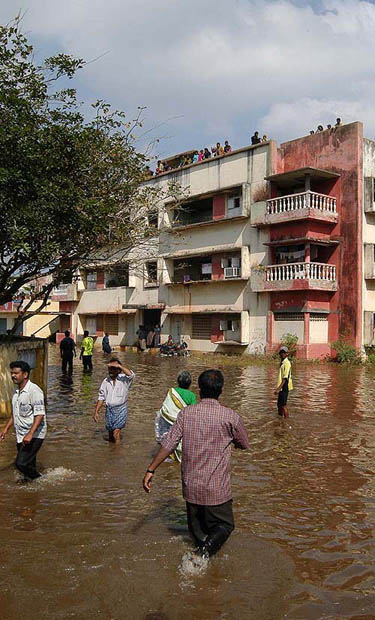 The tidal waves that struck the Marina Beach in Chennai after an under-sea earthquake left many homeless and beach water entered the nearest Housing Board colony on Sunday.  PTI