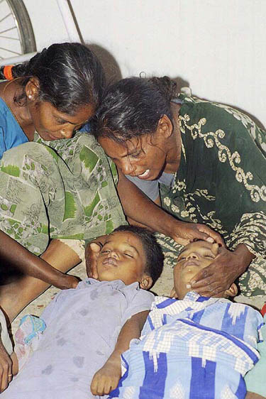 Wailing relatives in front of the bodies of their loved ones in Chennai on Sunday after a tidal wave swept the city, claiming many lives.  PTI