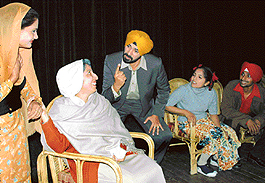 Artistes stage a play 'Sukhi Base Maskineya' during the Gursharan Singh Natya Utsav at Tagore Theatre, Chandigarh