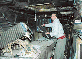 A shopkeeper at a shop that caught fire in Sector 20-C, Chandigarh on Tuesday. 