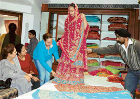 NRIs having their pick at a cloth store in Ludhiana