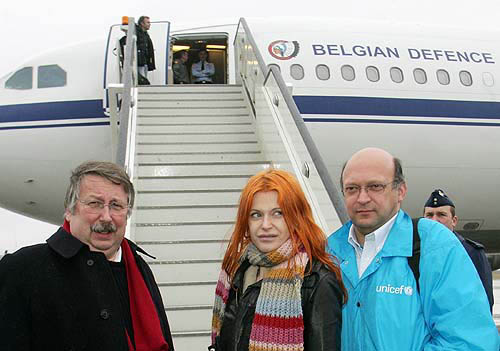 Belgium's Defence Minister Andre Flahaut (left) and pop singer Axelle Red (centre) stand with a Unicef official  in front of a military transport plane, bound for Sri Lankan capital Colombo, at the military airport of Melsbroek near Brussels, on December 28. Flahaut and Red, a goodwill ambassador for Unicef, are going on the flight to oversee the delivery of tonnes of blankets, clothes and medicine to survivors of tsunamis that killed more than 50,000 across Asia.  Reuters