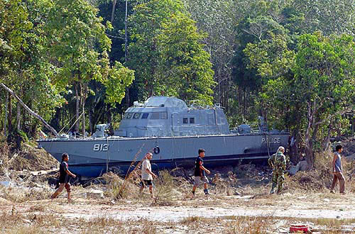 Rescue workers search for the bodies of victims of Sunday's tsunami in Phang Nga province, about 788 km south of Bangkok, on December 28.  Reuters