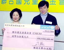 Hong Kong action star Jackie Chan presents a cheque for HK $ 5 lakh ($ 64,000) to United Nations Childrens Fund representative Anson Chan in Hong Kong on Wednesday. Chan donated the money to Unicefs earthquake and tsunami relief efforts in south Asia.