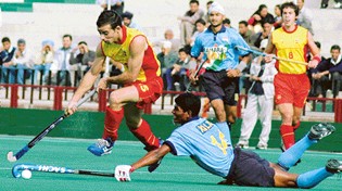 A hockey match in progress between India and Spain at hockey stadium of Chandigarh