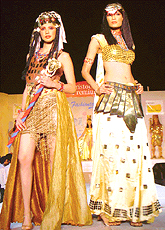 Models exhibit club wear at a fashion show in the city.