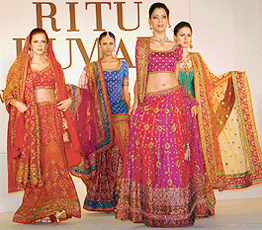 Models present the Ritu Kumars bridal collection.