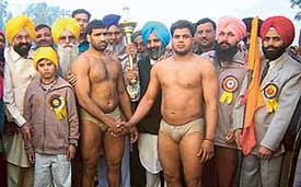 Mr Jagdish Singh Garcha, MLA, at the Baba Deva Dass Memorial Wrestling Championship at Lehra village. 