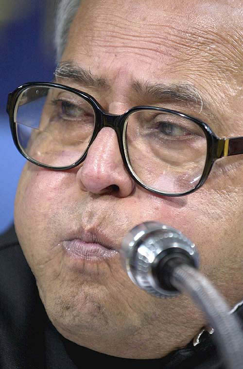 Defence Minister Pranab Mukherjee briefs the media in New Delhi on Wednesday after making assessment of the situation in the tsunami-affected areas.  PTI