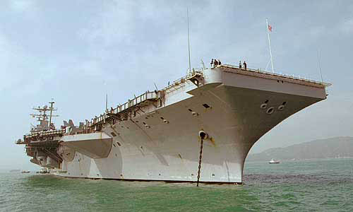 US aircraft carrier USS Abraham Lincoln is stationed at Hong Kong's Victoria Harbour in this picture taken December 24. The United States more than doubled its pledge to $35 million and ordered 12 vessels, including aircraft carrier USS Abraham Lincoln, to the Asian region which was affected by last Sunday's earthquake and tsunami.  Reuters