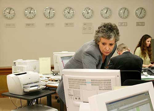 Employees of the German national crisis committee work in Berlin on December 29. German Chancellor Gerhard Schroeder cancelled his Christmas holidays to discuss the situation of German tourists in southern Asia. At least 100 Germans are believed missing as a result of the tsunami in the region.  Reuters