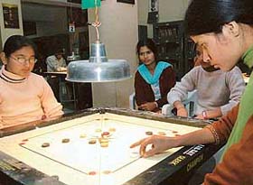Anjali Yadav in action during the 7th Raj Kumar Babuta Memorial Prize Money Carrom Ranking Tournament at St Stephen's School, Sector 45, Chandigarh