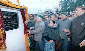 The Chief Minister, Mr Virbhadra Singh, inaugurates a bridge at Ghangal village near Sundernagar on Thursday.
