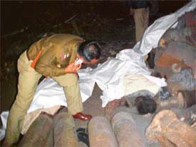 A policeman inspects the site of the blast that took place in a factory in Ludhiana on Thursday