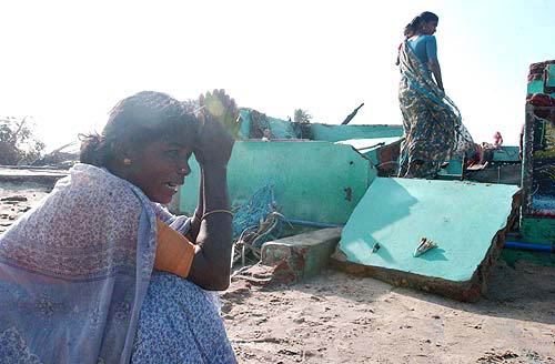 With their families and livelihood swept away by giant tsunami waves, these women have anguish and despair writ large on their faces, in a village in Nagapattinam on Thursday.  PTI