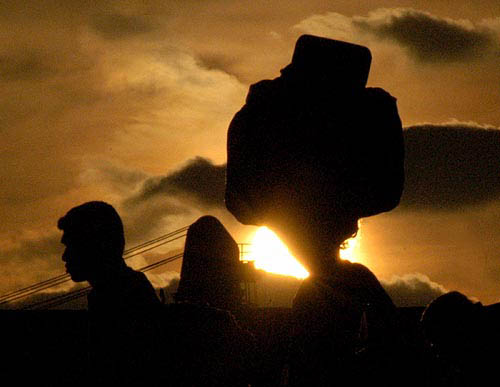 Tsunami survivors from Andaman island arrive at a port in Chennai on December 30.  Reuters