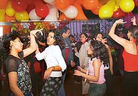 New Year revellers sway to the tune of a Punjabi pop number at a discotheque in Chandigarh