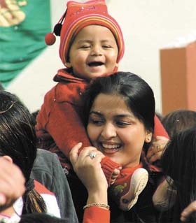 A mother with her child at Janpath in the Capital on New Years eve