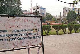 A rusted board with the name of martyr Lieut Kuldip Singh Parhar still stands in a corner of the Model Town market park in Jalandhar where the Municipal Corporation plans a shopping complex.