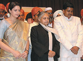 Delhi Chief Minister Sheila Dikshit with actress Nagma paying homage to the tsunami victims at a conference, organised by All India Muslim Yuva Ekta Committee at Ficci Auditorium in the Capital. 