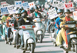 Girls take part in a rally organised by the Chandigarh traffic police as part of the 16th national Road Safety Week in Chandigarh on Tuesday.