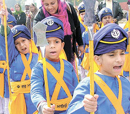 Children participating in the procession to celebrate the birth anniversary of Guru Gobind Singh in the Capital.