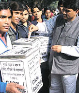 Congress workers collecting funds for the tsunami victims at All India Congress Committee headquarters in the Capital. 