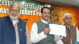 BJP Haryana in charge Shivraj Chauhan, along with Pradesh BJP President Ganeshi Lal and Mr Kishanlal Sangwan