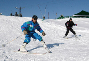 Tourists learning the skills of skiing at the Gulmarg Skiing Centre