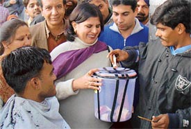 The Mayor, Ms Anu Chatrath, collects funds in the Sector 20 market in Chandigarh on Wednesday for the tsunami victims