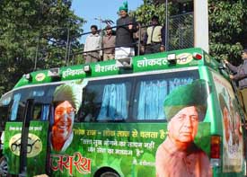 Haryana CM Om Prakash Chautala atop an improvised chariot at his official residence in Chandigarh on Thursday. The vehicle costing several crores would be used by Mr Chautala for campaigning in the Assembly elections