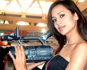 Model Sonalika launches the worlds first HDV 1080i compatible video camera in New Delhi on Thursday. 