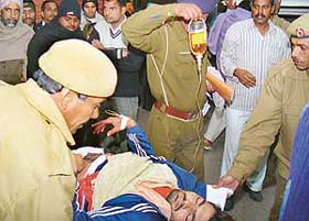 Ashok Kumar, who was wanted by the Gohana police, being rushed to the PGI, after he allegedly shot himself to evade arrest on Friday night