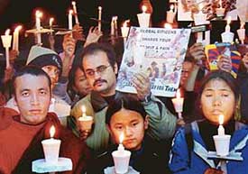 Students hold a candlelight procession in memory of tsunami victims in Chandigarh