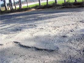 The poor condition of a road in the Malwa belt