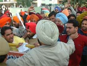 Unemployed ETT teachers protest in front of the residence of Prof Darbari Lal, Deputy Speaker, Punjab Vidhan Sabha, in Amritsar