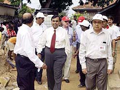 Mukesh Ambani, Chairman of the Foundation for International Federation of Red Cross and Red Crescent Societies, with Murli Deora, Vice-President of the body, at a relief camp near Negombo in Sri Lanka on Sunday.
