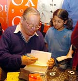 Noted author Ruskin Bond obliges autograph seekers during the launch of his new book, Book Of Nature And The Hidden Pool