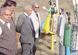 Mr Nek Chand, along with BBMB officials, supervises work at the Talwara Rock Garden being set up by the BBMBon Monday.
