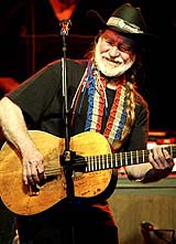 Country music legend Willie Nelson performs at a charity concert to benefit the tsunami relief effort
