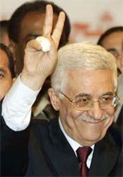 Palestinian Presidential candidate Mahmoud Abbas celebrates his landslide victory in an election