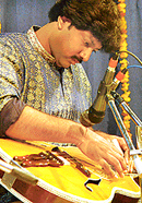 Salil Bhatt performs on satvik veena at Pracheen Kala Kendra in Chandigarh on Tuesday.
